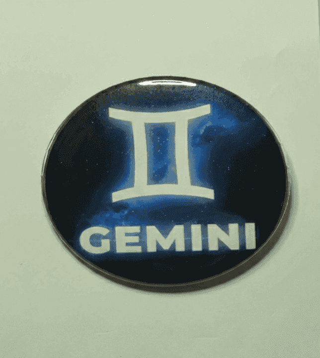 Gemini zodiac badge with constellation symbol and name