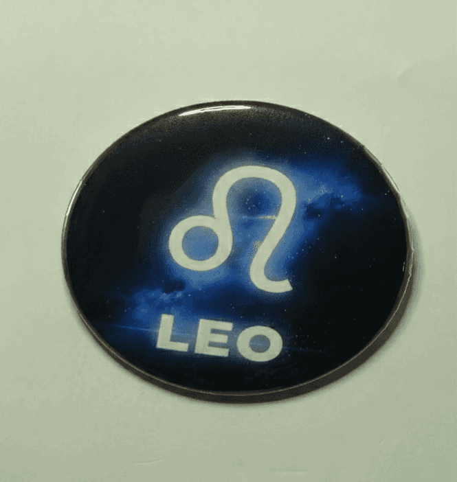 Leo Galaxy zodiac badge with cosmic blue background and white Leo symbol