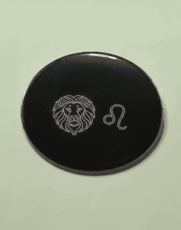 Leo zodiac badge with lion and Leo symbol