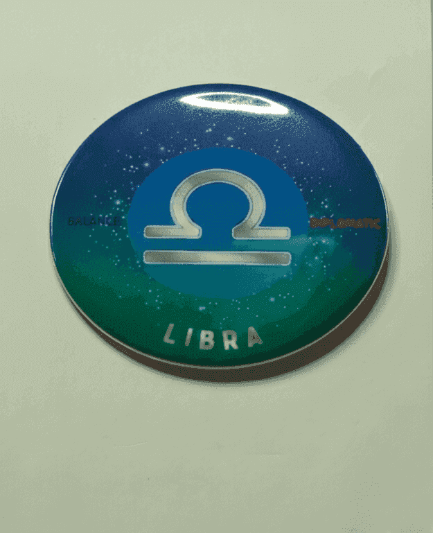 Libra Ombre zodiac badge with celestial stars and silver Libra symbol