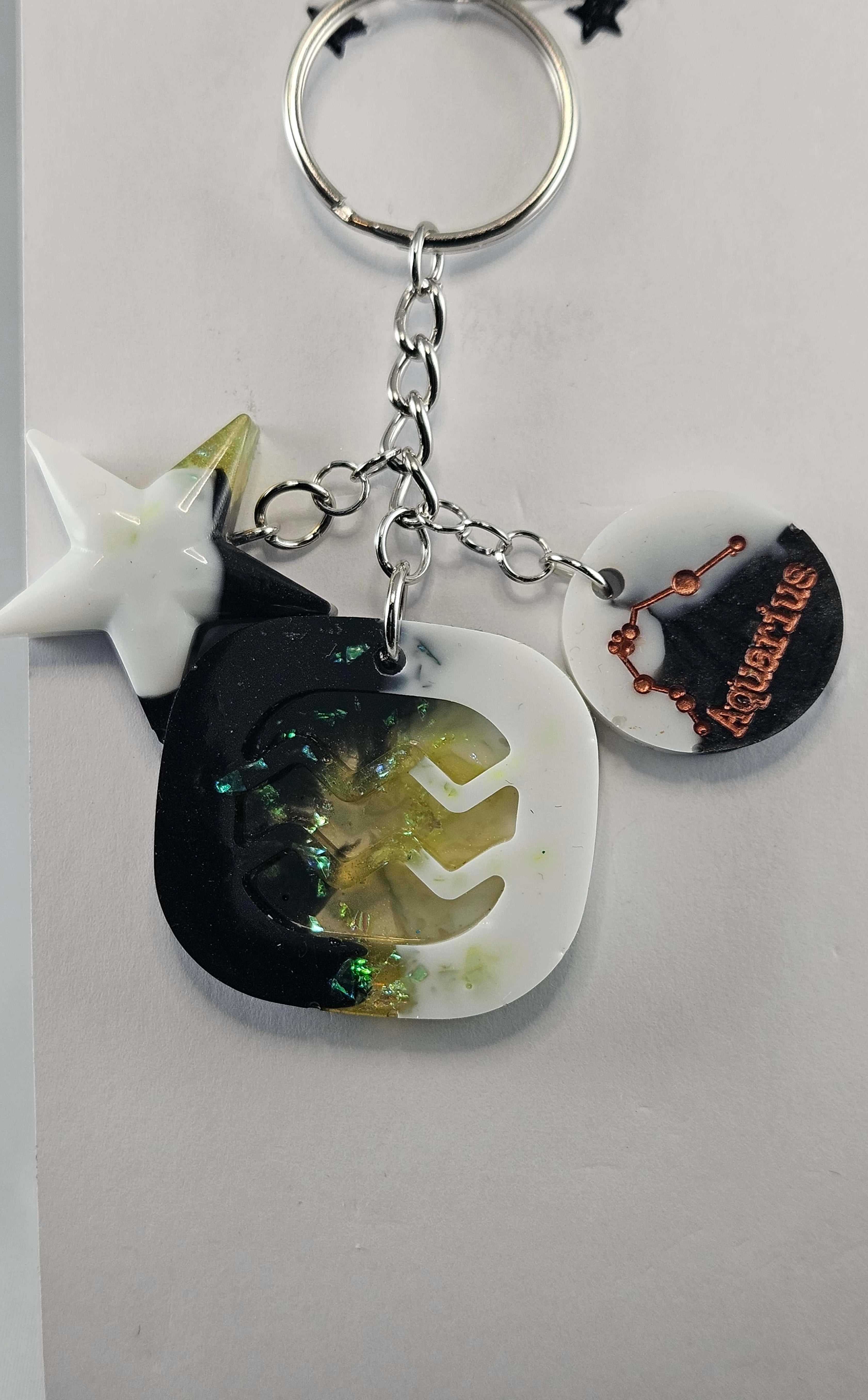 Miner's Galore Aquarius Keychain featuring Aquarius zodiac symbol astrology accessory