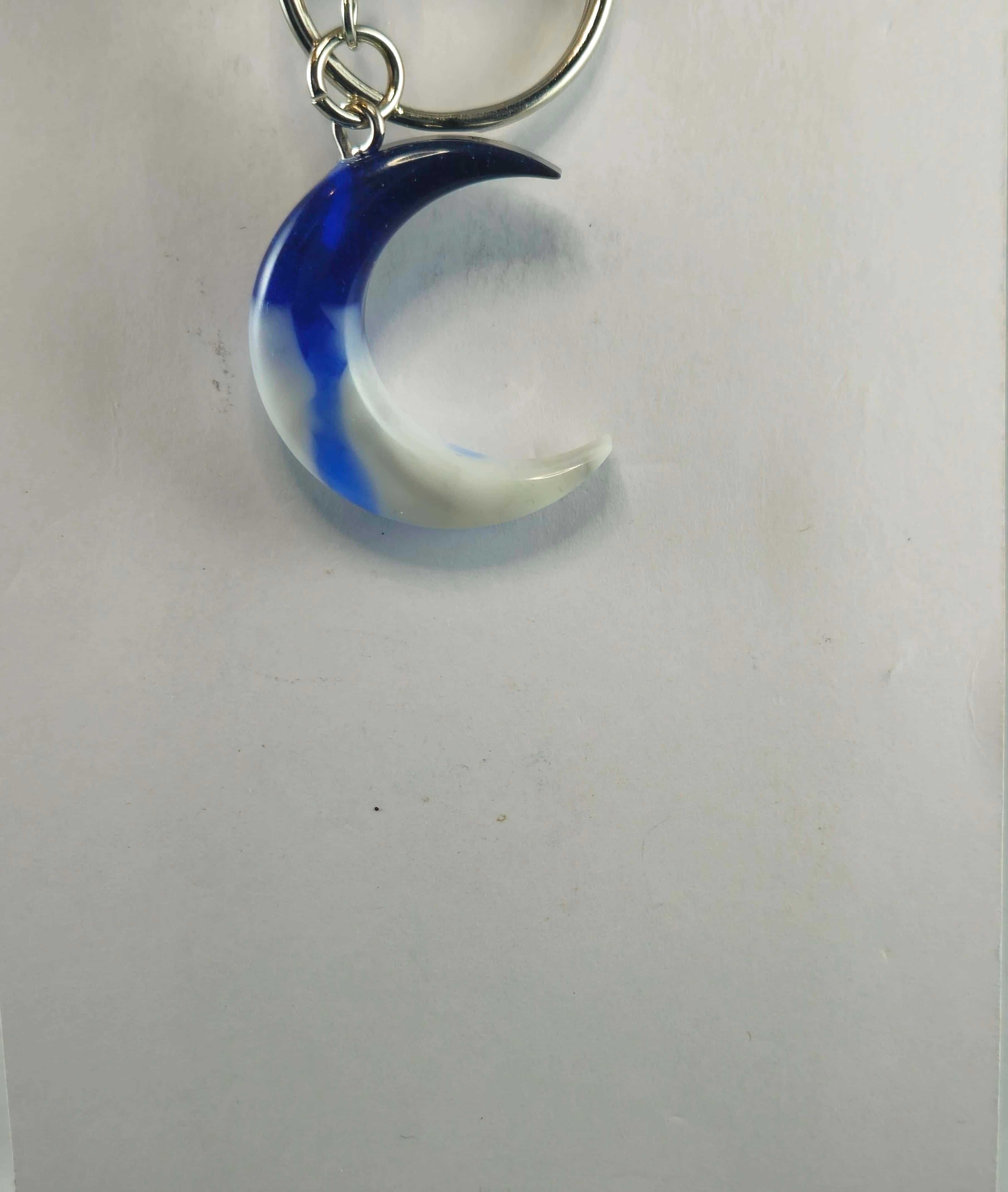 Blue and white crescent moon keychain with metal ring