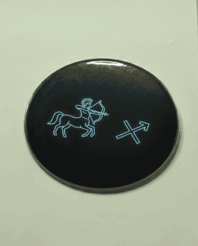 Sagittarius neon badge with archer symbol and arrow