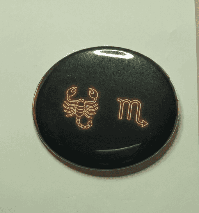Neon Scorpio zodiac badge with scorpion and Virgo symbol