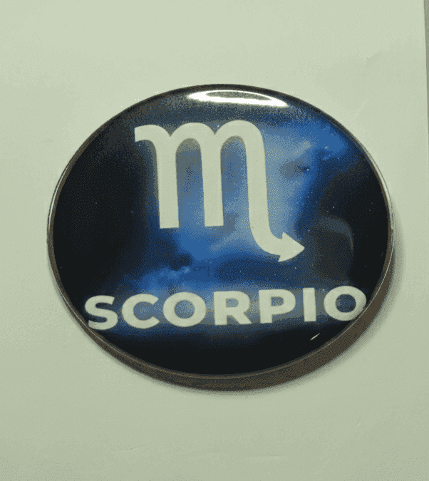 Scorpio Galaxy zodiac badge with navy and starry background