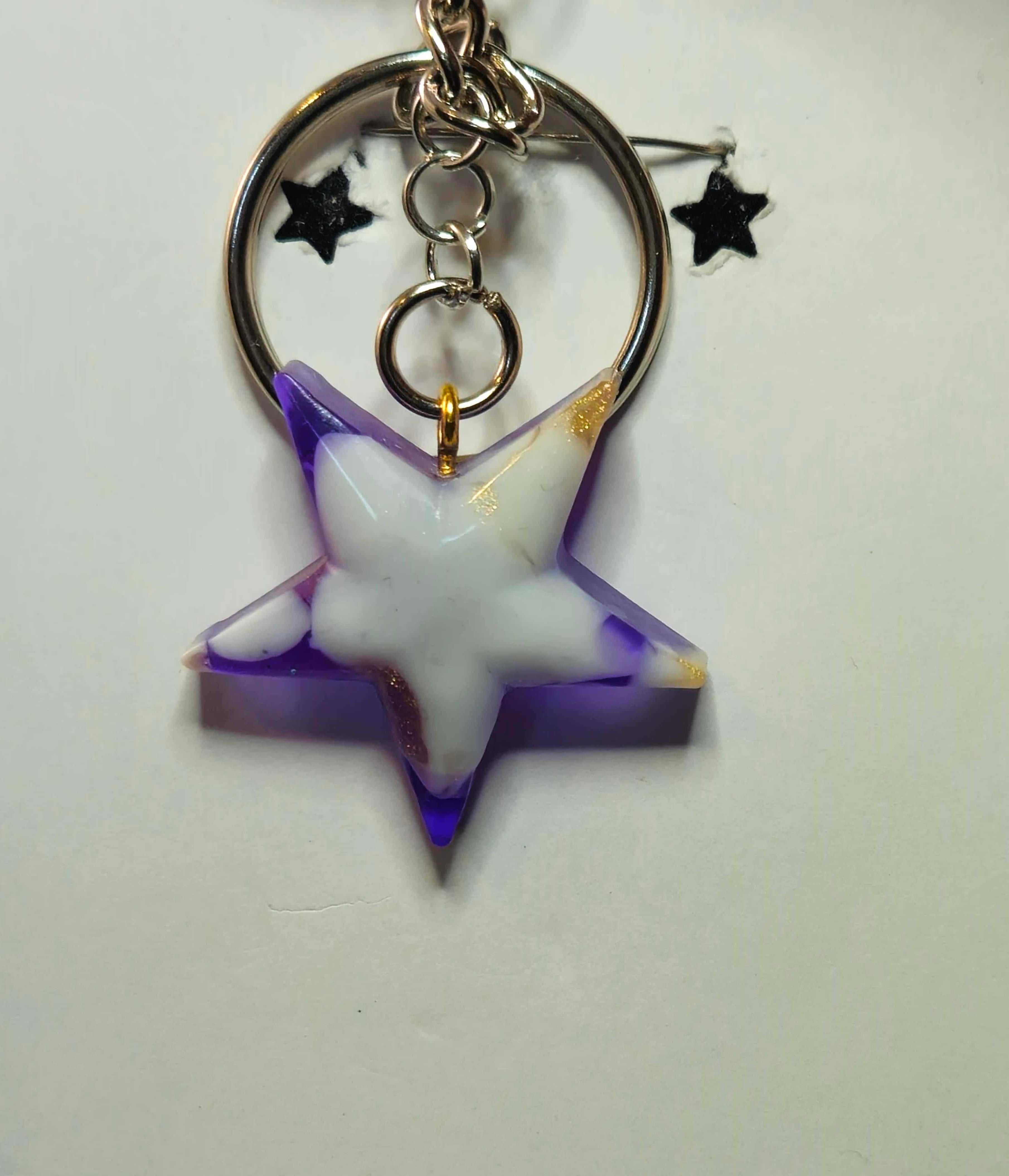 Stormy Weather Sagittarius Keychain with purple star-shaped zodiac charm.