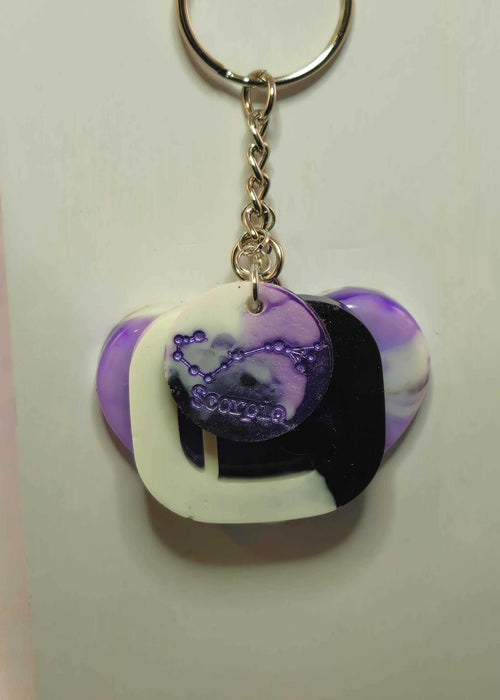 The Stormy Weather Scorpio Keychain features a Scorpio design that offers a classic and timeless look for everyday use