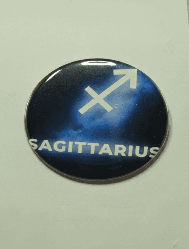 Sagittarius Galaxy zodiac badge with starry sky background